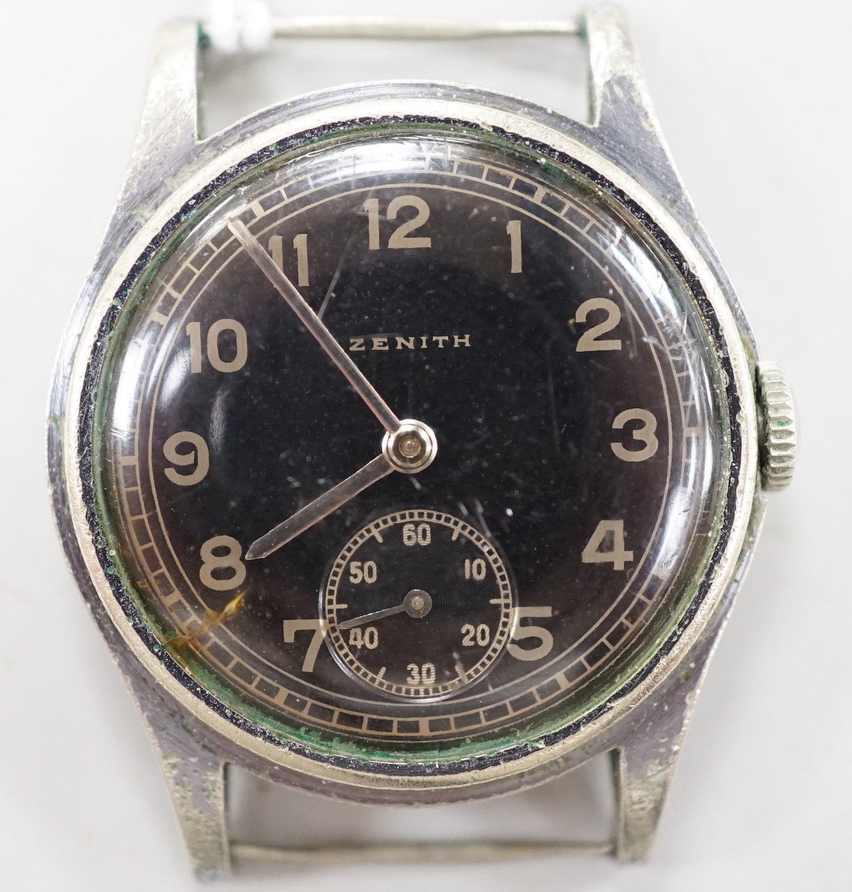 A 1930's/1940's? stainless steel Zenith black dial manual wind wrist watch, case diameter 30mm, no strap.